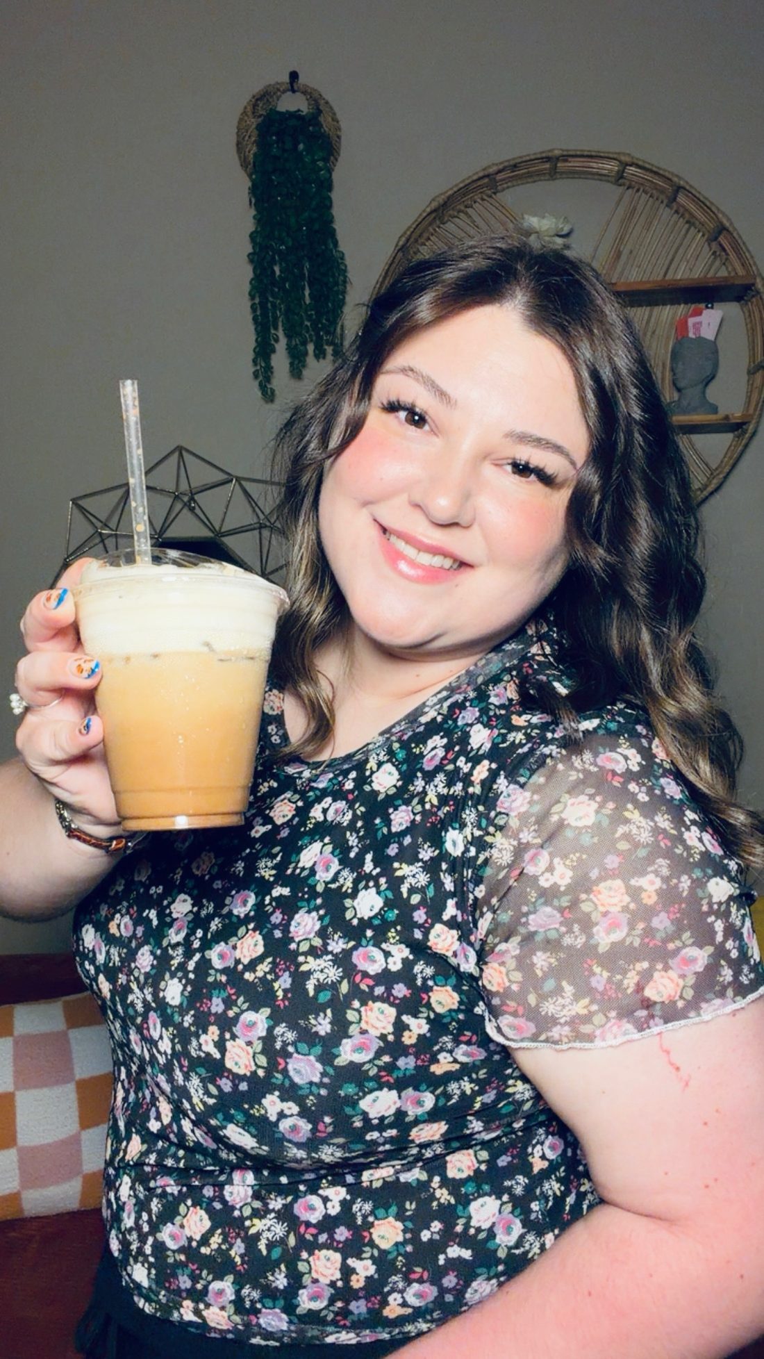 Ciera, owner of The Lash & Glow Cafe, in the studio