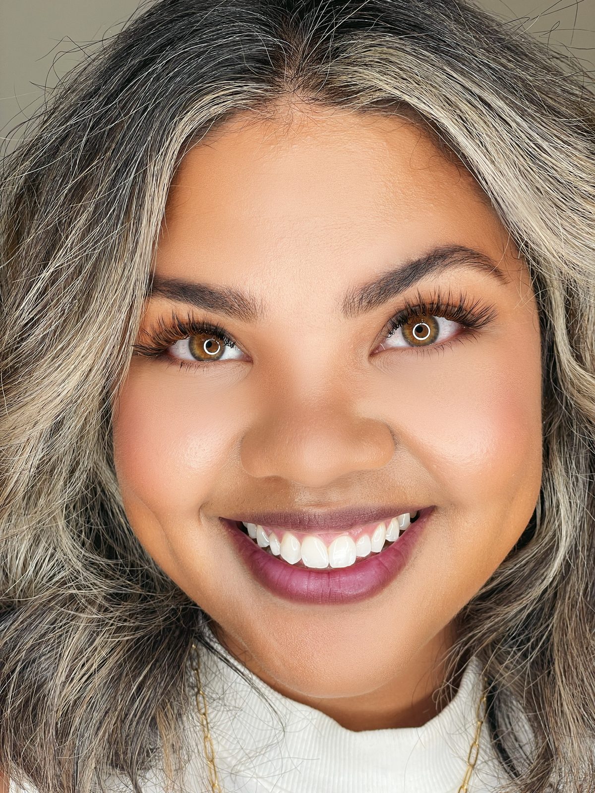 A client after a lash and brow appointment